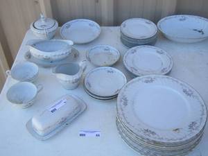 lot 65 image: Gold Standard dish set butter dish- plates- cups- sugar dish plus