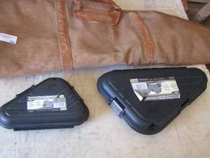 lot 30 image: 2 gun cases plastic and a rifle holder