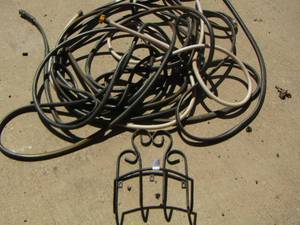 lot 252 image: 2 water hoses and a water hose holder