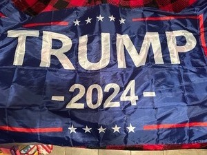 lot 4 image: TRUMP 2024 FLAG - 3FT X 5 FT - PACKAGE WAS DAMAGED SO WAS Removed � has rust around grommets