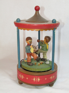 lot 124 image: Thorens Swiss movement Hand-carved Schmid with two boys musicians music box