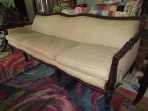 lot 131 image: Victorian era Circa 1900 sofa which matches wing chairs (Lot 128)-needs re-upholstered