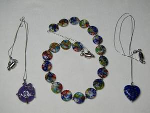 lot 160 image: .925 silver pendant necklace and 10k vermeil (silver plated gold) necklace with heart pendant, and a glass bead necklace