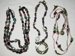 lot 169 image: Abalone shell and .925 silver necklace, .925 silver and polished stone necklace, and glass bead and stone necklace