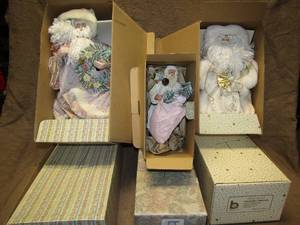 lot 216 image: Brinns 1990 - 1991 two Santa dolls and one Santa tree topper