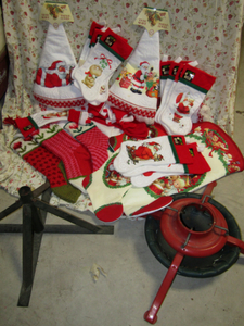 lot 250 image: Assorted Christmas tree stocking, skirts and stands