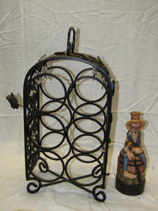 lot 312 image: Ceramic hand-made whiskey bottle and rack