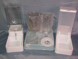 lot 339 image: Two sets animal feeder waterfood dispensers