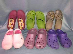 lot 366 image: Croc brand slip on Size 8-9 Six Pairs