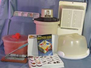 lot 381 image: Assorted Tupperware, ice-cream maker, sink strainer, nut cracker & cake decorating set