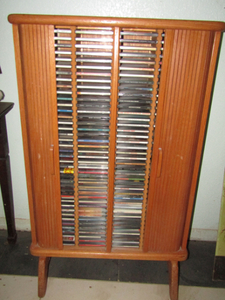 lot 398 image: Solid Wood cabinet full of Assorted CD Music-Classical to Rock to C&W