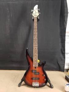 lot 102 image: Yamaha Y1911 4 String Sunburst Bass Guitar