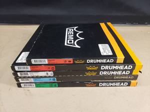 lot 284 image: Lot of REMO Drum Heads.  Powerstroke Coated 14, Pinstripe Clear 13, Silentstroke 13, Emperor Clear 13 & Emperor Clear 8