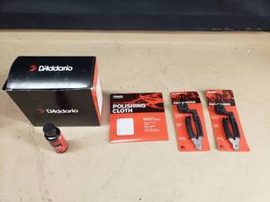 lot 290 image: Lot of Misc DAddario Instrument Maintenance Accessories.  Includes Everything Pictured.
