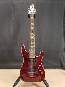 lot 26 image: Beautiful Schecter Diamond Series Omen Extreme-7 Black Cherry 7 String Electric Guitar w Case