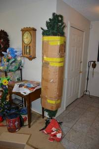 lot 14 image: 7 Ft. Christmas pre-lit Tree with stand and tree skirt