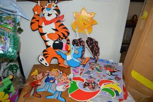 lot 16 image: Cereal cardboard cutouts and  window decorations as shown