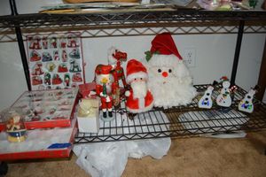 lot 21 image: Christmas decorations with wooden ornaments and Snowmen stained glass votive holders