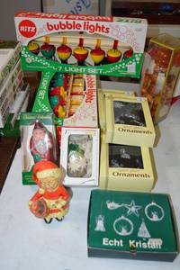 lot 48 image: Vintage bubble lights, spun glass ornaments, nutcracker, and Mrs. Claus figurine