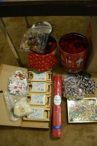lot 55 image: Wooden sleigh crafts, beaded garland, red mesh ribbon and more
