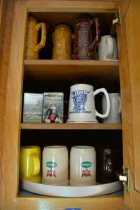 lot 67 image: Beer steins and Oktoberfest music cassettes
