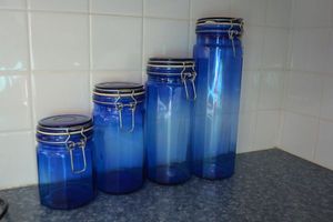 lot 69 image: Blue glass cannister set