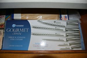 lot 114 image: Hessler knifes, cooking thermometers, and wooden skewers