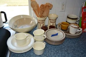 lot 73 image: Stoneware dishes and dishes with green trim