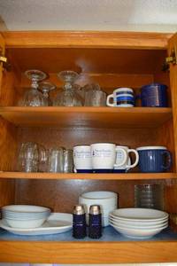 lot 75 image: Kitchen - Corelle dishes, Bavaria Germany white bowls, Blue and white mugs, clear glassware