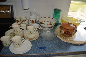 lot 76 image: Partial sets of Strawberry dishes, Vintage yellow Pyrex bowl, Clear glass platters (Joska stickers), and more