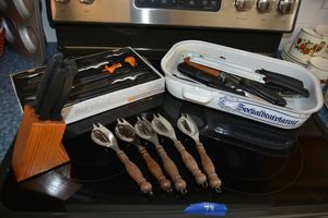 lot 78 image: Misc. knives and knife sets, spork set, and European metal pan