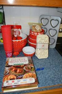 lot 83 image: Valentines lot - Favorite Brand Name Cookbook, Germany red and white bowls, heart cookie cutters, heart shaped ice cube trays, heart shaped baking pan