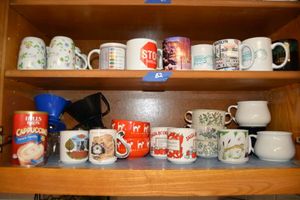 lot 82 image: Coffee mugs and cups plus unopened Cappuccino mix