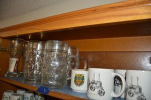 lot 81 image: Tractor set of coffee mugs, American military engineers mug and beer glasses, beer steins
