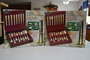 lot 130 image: 2 boxes unopened Gold plated Flatware (16 place settings total)