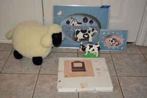lot 163 image: Country themed lot - Cow wall art, Love Abides craft, plastic cow, and plush sheep