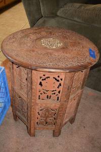 lot 168 image: Vintage wood carved collapsible side table with octagon shaped base 17round x 19tall