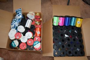 lot 173 image: 2 Boxes of ribbons, numerous colors, most are unopened.