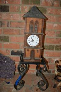 lot 148 image: Clock tower with iron stand. About 30 tall.