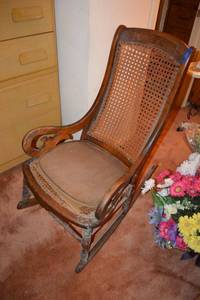 lot 301 image: Vintage cane rocking chair as shown