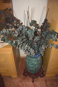 lot 304 image: Vase and stand with eucalyptus