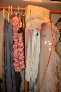 lot 331 image: Lacy tablecloths, tapestry fabric and Hawaiian leis