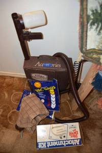 lot 333 image: Vintage Kirby vacuum with attachments