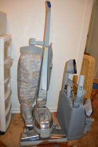 lot 184 image: Vintage Kirby vacuum with attachments