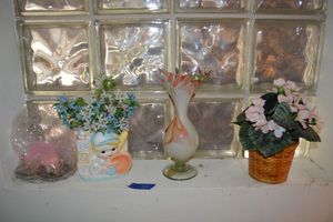 lot 211 image: Vases and plants (one is handblown vase)