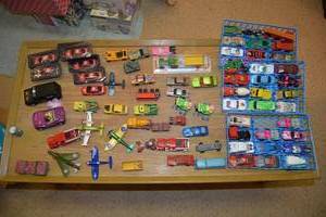 lot 214 image: Miniature toy cars and planes - Hot Wheels and Tootsie brands included