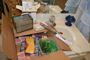 lot 216 image: Bath soaps, curling iron and craft stamps