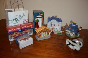 lot 251 image: Radio Flyer Christmas ornaments, ceramic nativity scene, Mickey mouse ornament, ceramic houses