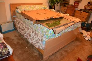 lot 252 image: Full size bed and frame with matching mirror