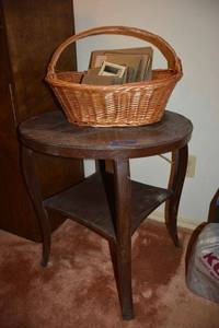 lot 261 image: Vintage side table with basket of antique photos and mattes